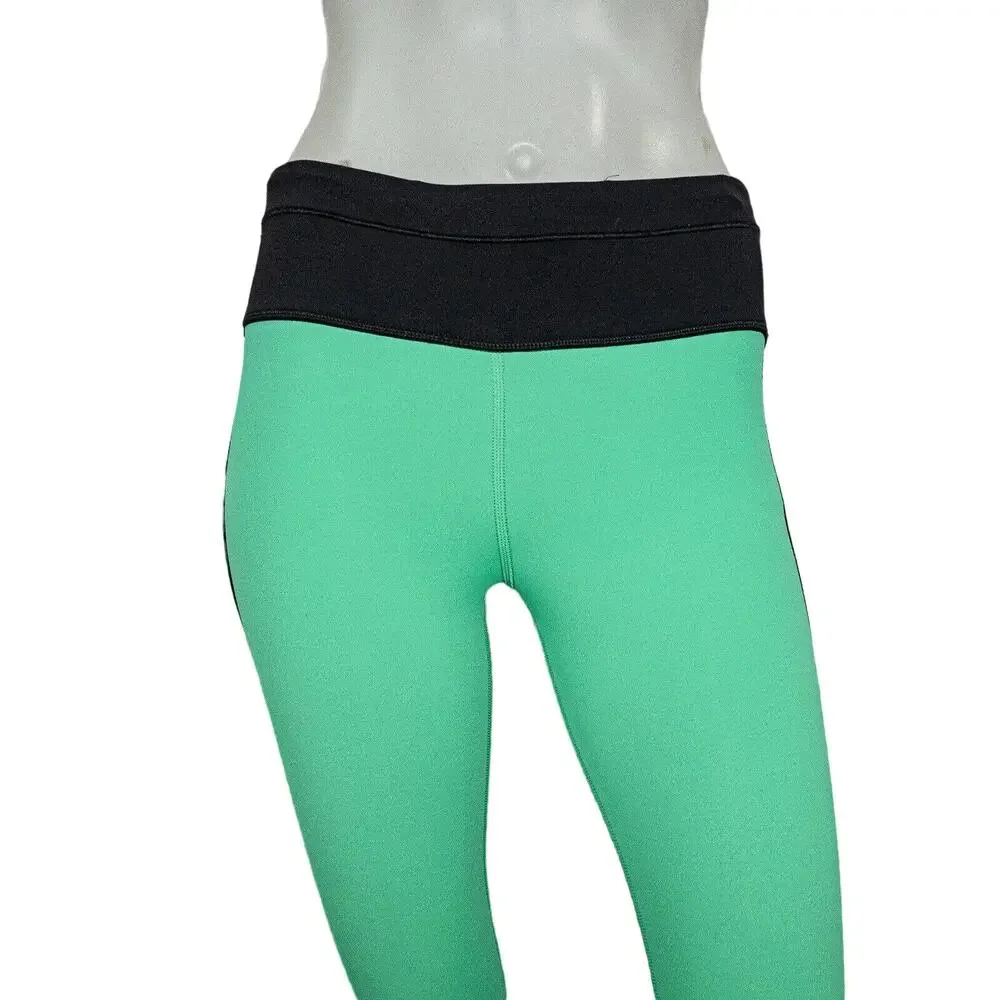 Lululemon two tone Green Black Leggings mesh side size 4